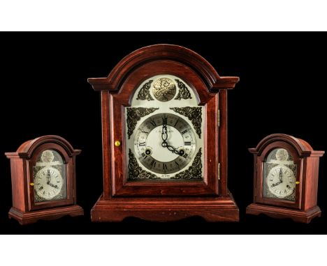 Tempus Fugit Mahogany Cased 8 Day Striking Mantle Clock strikes on two rods. Working at time of cataloguing. Measures 14.25 i
