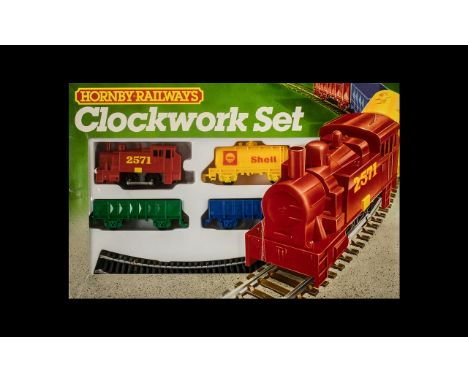 Hornby Railways Boxed Clockwork Set comprising 1/ 0-4-0 Clockwork Engine and key, 2/ Assorted Wagons, 3/ Circle of First Radi