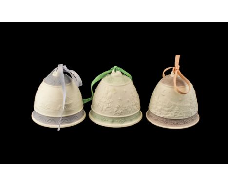 Collection of Three Lladro Christmas Bells in lilac for 1992, mint green for 1992 and lilac for 1993.  All in good condition 