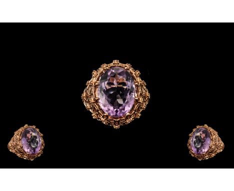 Rose de France Amethyst Solitaire Ring with unusual openwork mount; an oval cut solitaire amethyst of 9cts, fully surrounded 