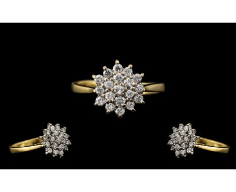 18ct Gold Attractive Starburst Diamond Set Cluster Ring.  The round brilliant cut diamonds of excellent colour and clarity.  