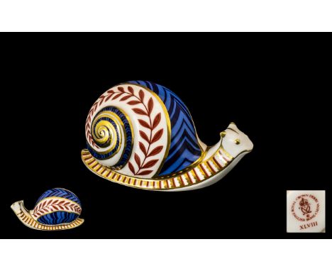 Royal Crown Derby Paperweight 'Snail', ceramic stopper, available 1985- 1991; decorated in the classic spiral design/ shell p
