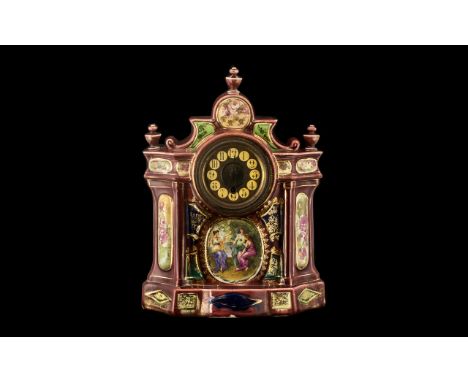 Large Edwardian Pottery Mantle Clock with printed panels of the Three Graces to centre.  Shaped pediment top.  Measures 15" t