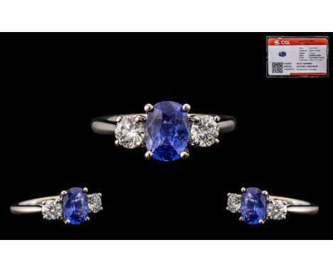 Platinum Set Superb Quality 3 Stone Sapphire and Diamond Set Dress Ring - marked 950 platinum. The central blue natural corun