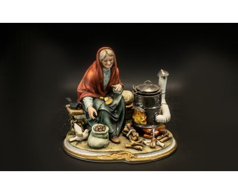 Capodimonte Statement Piece Woman Cooking Chestnuts. Handmade Italain porcelain figure by the italian artist Luciano Cazzola.