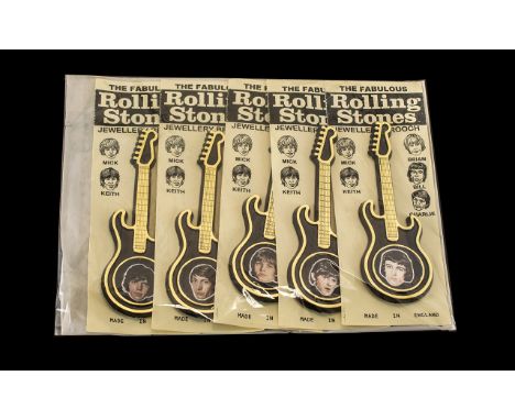 The Rolling Stones full set of five original brooches, still on cards.  Issued by Invicta Co., England.  Mick, Brian, Bill, C