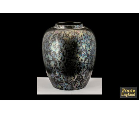 Poole Early Period Large Ovoid Shaped Lustre Vase mottled blue on black ground.  Marked Poole, England to underside of vase. 