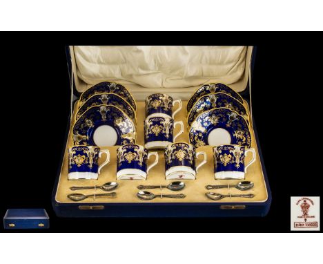 Royal Crown Derby Superb Quality 12 Piece Hand Painted Coffee Set in Cobalt blue and gold, date 1933, with six sterling silve