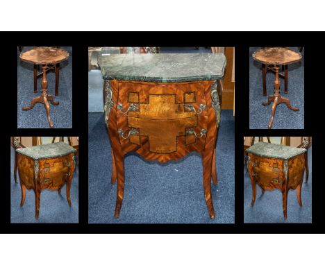A French Style Bombe Shaped Mid to Late 20th Century Commode marble top above two drawers raised on cabriole legs with ormolu