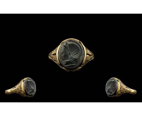 Gentleman's 9ct Gold Haematite Intaglio Set Signet Ring with image/bust of a Roman Centurian to centre.  Full hallmark for 9.