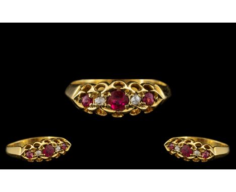 Antique Period Attractive 18ct Gold Ruby and Diamond Set Ring, excellent gallery setting/design, marked 18ct, the three natur