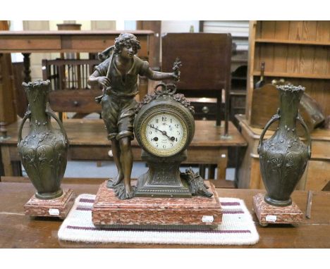 A French Spelter Figural Striking Mantel Clock Garniture, 44cm high vase shaped garniture, 34cm