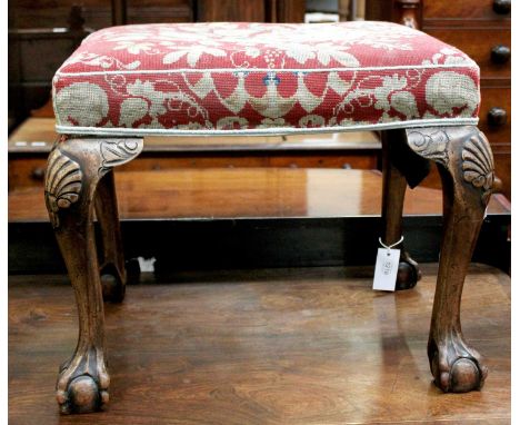 ~ A 19th-century Carved Walnut Stool in George II Style, with tapestry upholstered seat and on claw and ball cabriole support