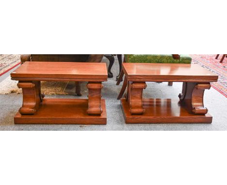 A Pair of Modern Oak Lamp Tables, on scroll carved supports, each 72cm by 45cm by 41cm
