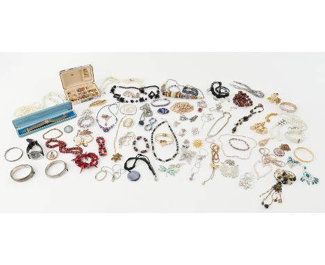 A large collection of costume jewellery to include earrings, faux pearls, necklaces, some silver items of jewellery, bracelet