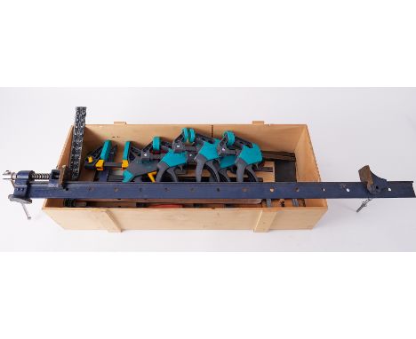 A collection of clamps including one 4ft sash clamp, six wolf craft hand clamps etc.