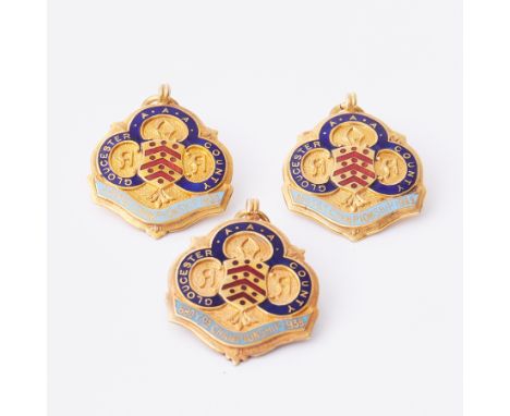 Three 9ct yellow gold &amp; enamel medallions, 'Gloucester AAA County 880Y DS Championship' one 1938, two 1939, (3), total we