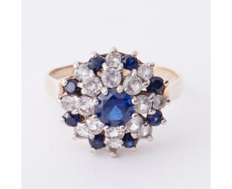 A 9ct yellow gold round cluster style cocktail ring set with round cut blue sapphires, total sapphire weight approx. 0.60 car