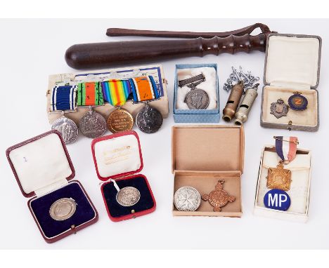 A collection of medals including a Great War trio awarded to W.H.B.Endacott and later Metropolitan Police medals incl tug of 