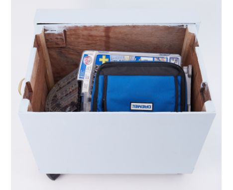 A box containing large selection of Dremor tools and accessories.