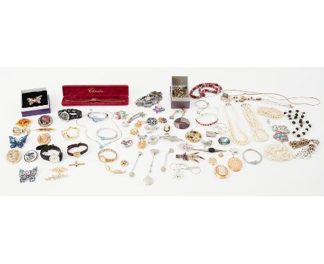 A large collection of costume jewellery including brooches, bracelets, faux pearls, necklaces, earrings, watches to include C