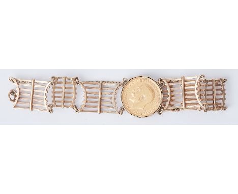 A 9ct yellow gold gate bracelet with a 1911 George V full sovereign, 24.39gm.
