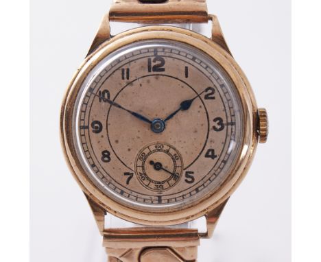 A 9ct gold vintage wristwatch engraved on the back 'Presented to Col W T Woods by the Officials of the A.A.C. Western Group 1