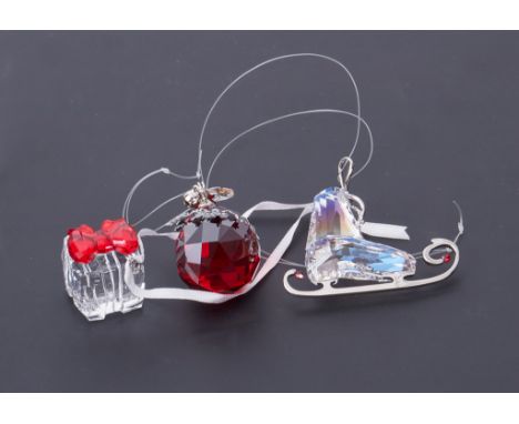 Swarovski Crystal Glass, Christmas gift ornament, Winter Skate and Ball Light Siam Satin, all boxed.