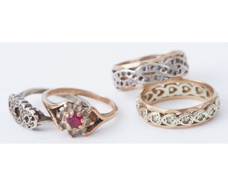 Four rings to include a silver ring (stones missing) 2.37gm, a 9ct ring set red &amp; white stones, 2.48gm, a 9ct &amp; silve