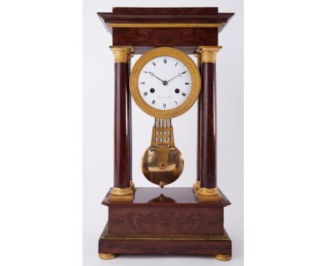 A French 19th century portico clock, marked on dial 'Gerard A Paris', height 55cm.