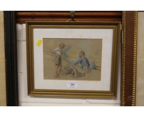 A framed pastel sketch of two girls contained in gilt frame 