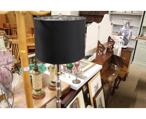 A chrome standard lamp and shade 