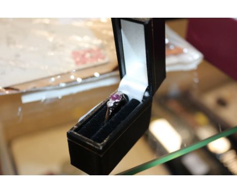 A 9ct gold ruby and diamond set ring 