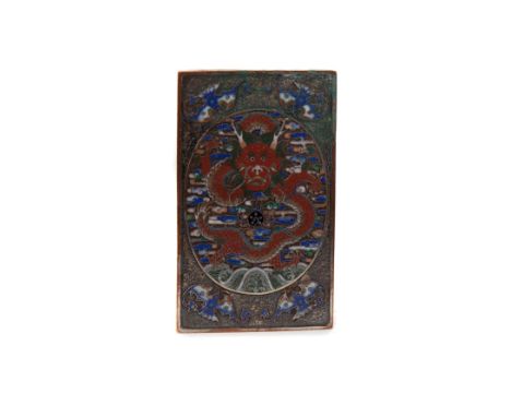 CHINESE ENAMEL DESK WEIGHT, decorated with a dragon and pearl design in coloured enamels, on a silvered metal body