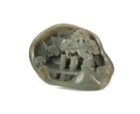 20TH CENTURY CHINESE JADE DESK WEIGHT, carved in relief with a pair of lions, trees and figures, 15cm wide