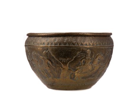 INDO-PERSIAN BRASS PLANTER, decorated in relief with a hunting scene between floral borders, 28.5cm diameter