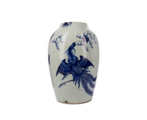 EARLY 20TH CENTURY CHINESE BLUE AND WHITE VASE, painted with a dragon chasing a pearl and a phoenix, 33cm high