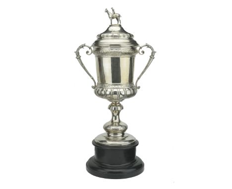 A large silver twin-handled trophy cup and cover,  by Charles Boyton & Son, London 1926,    of campana form, the cover with c