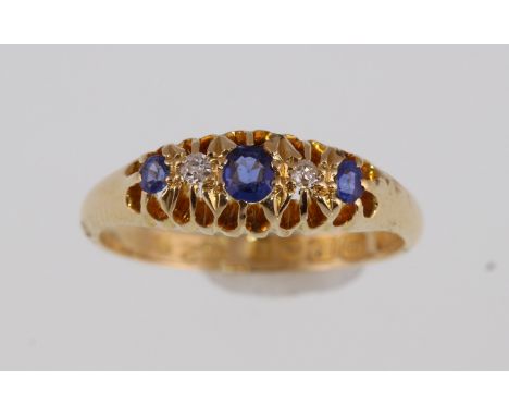 An 18ct sapphire and diamond five stone ring H/M Birmingham 1916, approx 3.7gms, size N