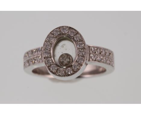 A CHOPARD 'Happy Diamond' style, heavy 18ct white gold diamond set ring, approx 9.6g & size N