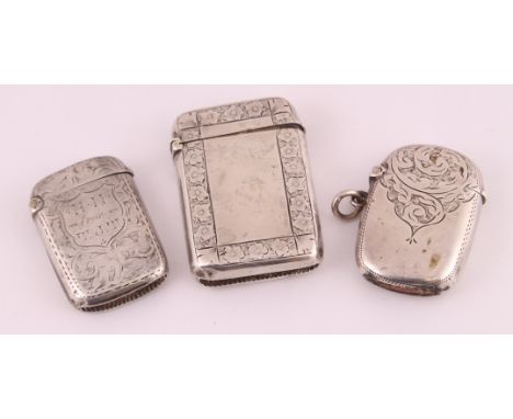Three silver H/M vesta cases all with engraved decoration, various dates