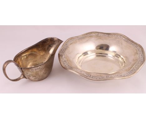 A small silver sauceboat H/M Sheffield 1931 together with an embossed dish marked 'Gorham STERLING', together approx weight 1