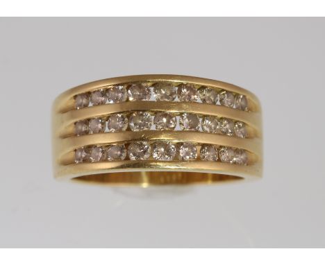 An 18ct H/M diamond triple channel set ring totalling approx 1.00ct & 7gms, size O