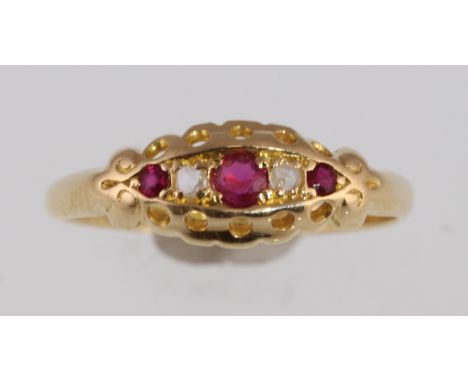 An 18ct ruby and diamond five stone ring H/M Birmingham 1920, approx 2.2gms, size Q