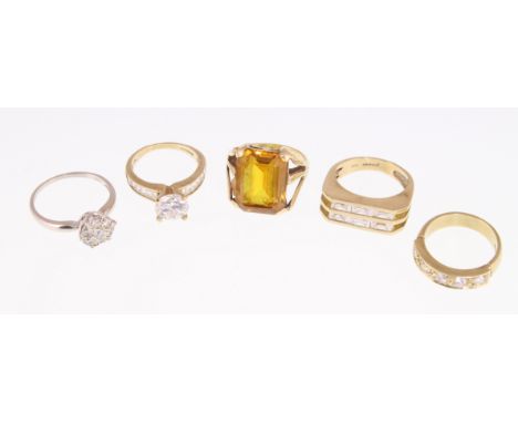 Four 9ct H/M CZ set rings & another stone set ring marked 9ct, together approx 23gms 