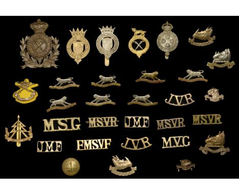 A Selection of Insignia from Malaya. Comprising a scarce Volunteer Guides badge; State Guides cap badge, button and shoulder 