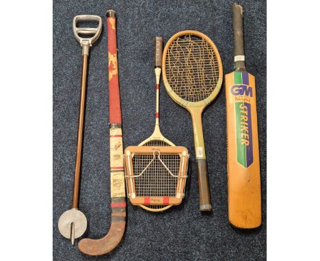 A collection of vintage sporting equipment; Signed cricket striker bat, hockey stick &amp; tennis &amp; badminton together wi