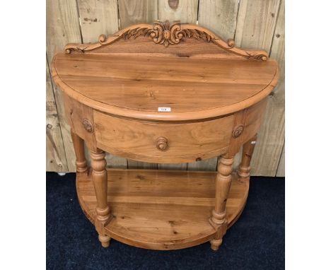 Antique style pitch pine hall moon console table, carved back finial with single bow shaped drawer front [94x91x46cm] 