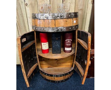 Half whisky barrel drinks cabinet, Cleaned up and maxed oak half barrel, fitted shelf interior. 