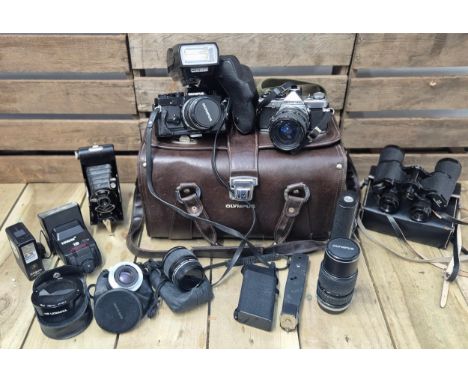 A collection of Olympus cameras, lenses &amp; accessories together with leather Olympus bag, Cornet bellows camera &amp; set 